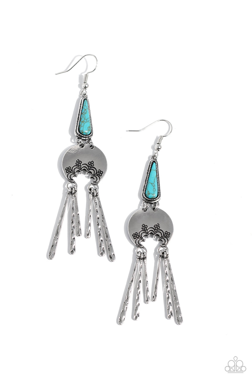 Highland Haute - Blue and Silver Earrings - Paparazzi Accessories - A turquoise stone pressed in a studded triangular fitting, and a silver floral-decorated half moon frame link into an earthy lure. A collection of daintily textured silver tassels in varying sizes swing from the bottom of the stacked frame for a whimsical finish. Earring attaches to a standard fishhook fitting.