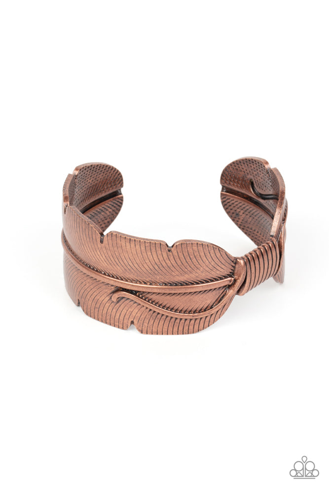 Quill Quencher - Copper Cuff Bracelet - Paparazzi Accessories - Infused with faux metal laces, an oversized copper feather asymmetrically curls around the wrist for a whimsical Southwestern vibe.