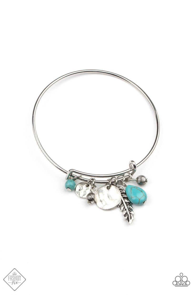 Root and Ranch - Blue Turquoise Bracelet - Paparazzi Accessories - A shimmery silver feather charm, ornate silver beads and earthy turquoise stone beads glide along the fitted center of a dainty silver bangle-like bracelet for a whimsically charming look. Sold as one individual bracelet.