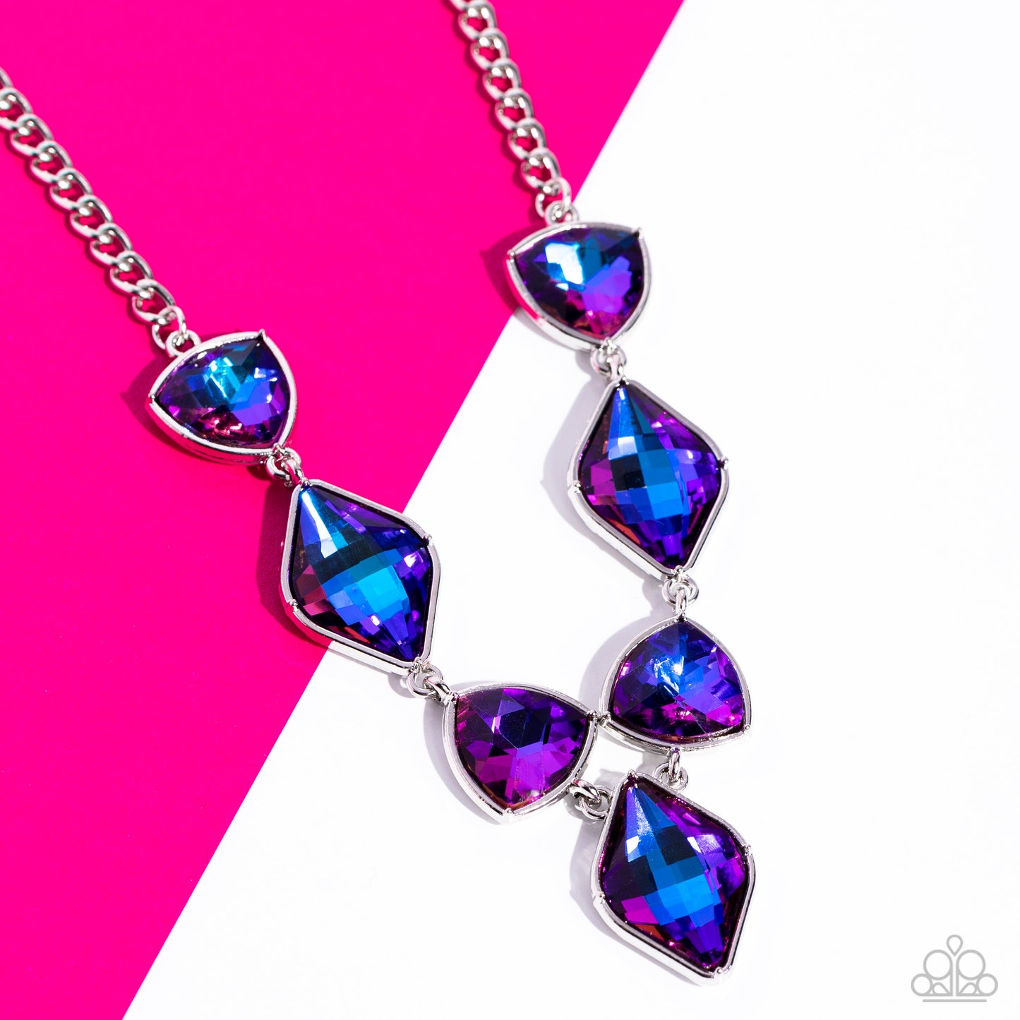 Glittering Geometrics - Purple and Silver Necklace - Paparazzi Accessories - Set in silver frames, glittering geometric purple shapes with a UV shimmer delicately coalesce around the collar for a statement piece. Features an adjustable clasp closure.